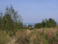 Neředín-pohled od letiště na panorama Nízkého Jeseníku a kostel sv.Cyrila a Metoděje v Hejčíně-Foto:Ulrych Mir.