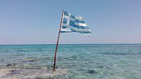 Vlajka v moři u Amoudi.