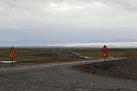 Island: zúžení silnice - most