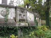 Lesní hřbitov - znak města