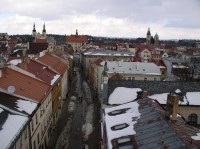 Pohled z věže na Jakuba: Pohled z věže směrem na Masarykovo náměstí. Jsou vidět věže kostelů sv. Ignáce a Jakuba