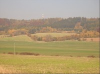 Z jihozápadu: pohled ze silnice z obce Hředle do obce  Mutějovice