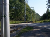 Rozcestí: Detail na značení rozcestí, zelená vravo na Kyjovice, modrá rovně na Horník