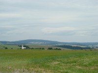 Pohled z vrcholu na Hraničné Petrovice, vpravo Moravský Beroun