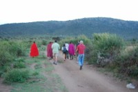 Tourists Walking to Cultural Masai Village