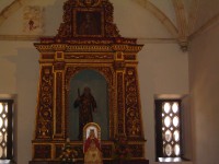 Santo Domingo další z postranních oltářů