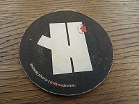 tácek s logom pivovaru