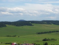 Údolí se silnici z Valšova  do Bruntálu-v pozadí Velký a Malý Roudný-Foto:Ulrych Mir.