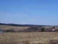 Nízký Jeseník s panoramatem Hrubého Jeseníku s Pradědem od silnice z Jívové do H.Patrovic-Foto:Ulrych Mir.