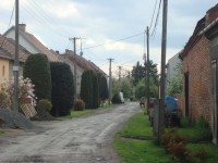 Čehovice-sloup se sochou sv.Floriána z r.1886 na záhumenku-Foto:Ulrych Mir.