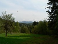 Pohled od Radkovského vrchu k východu, v pozadí Kašperk