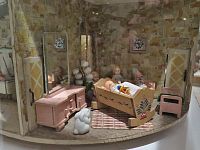 interiér Gočárovy otočné vily pro panenky