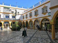 v centru