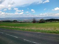 výhled ze silnice u Kostomlat na Teplice a Krušné hory