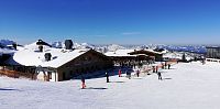 Skiareál Steinplatte - restaurace u horní stanice kabinkové lanovky z rakouské strany