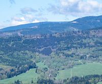 Nepatrně viditelná Staezka v oblacích