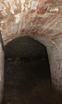 Cihlová klenba chodby do  části hradního sklepa