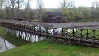 krytý drevený most a plávajúci lodný mlyn
