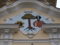 Znak na budově staré radnice