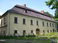 Zámek: Jesenický zámek, bývalá budova zemědělského družstva