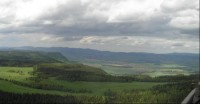 pohled od chaty PTTK: pohled do Broumovské kotliny, v pozadí Javoří a Soví hory